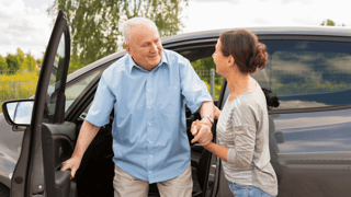 Elderly-person-getting-out-of-a-car